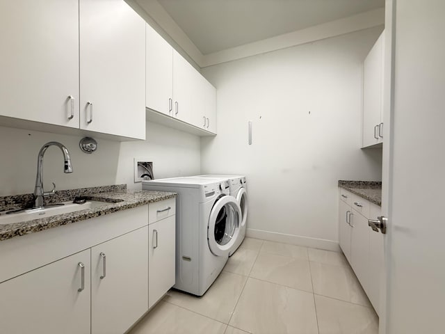 8803 Skyward St, Boca Raton, FL 33496 - washroom featuring cabinet space, baseboards, and washer and clothes dryer