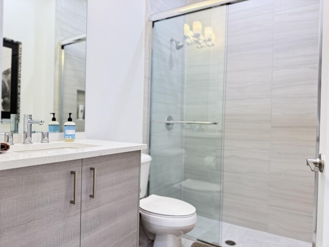 8803 Skyward St, Boca Raton, FL 33496 - full bathroom with vanity, toilet, and a stall shower