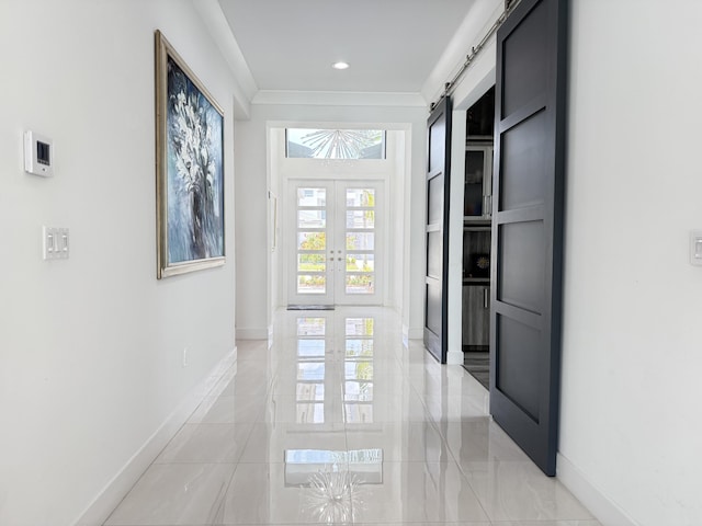 8803 Skyward St, Boca Raton, FL 33496 - corridor featuring baseboards, a barn door, french doors, and crown molding