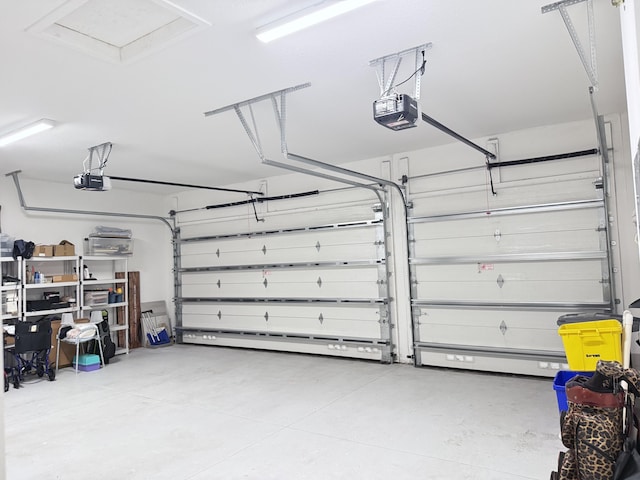 8803 Skyward St, Boca Raton, FL 33496 - garage featuring a garage door opener