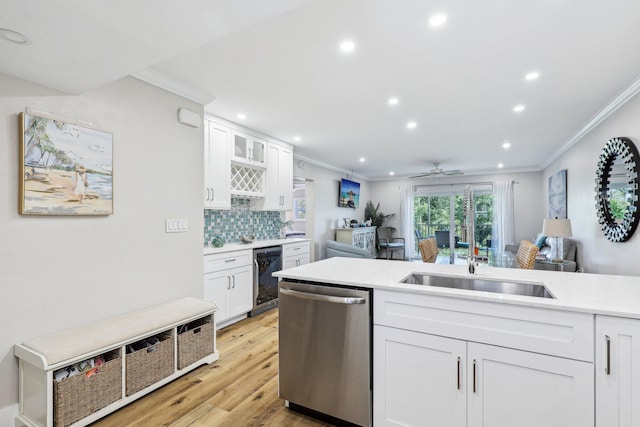 200 E Royal Palm Rd Unit 3040, Boca Raton, FL 33432 - kitchen featuring stainless steel dishwasher, ornamental molding, beverage cooler, white cabinetry, and light wood-type flooring
