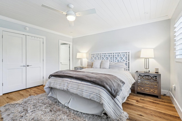 200 E Royal Palm Rd Unit 3040, Boca Raton, FL 33432 - bedroom with light wood-type flooring, ornamental molding, a ceiling fan, wood ceiling, and baseboards