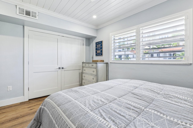 200 E Royal Palm Rd Unit 3040, Boca Raton, FL 33432 - bedroom with wood finished floors, crown molding, baseboards, a closet, and recessed lighting