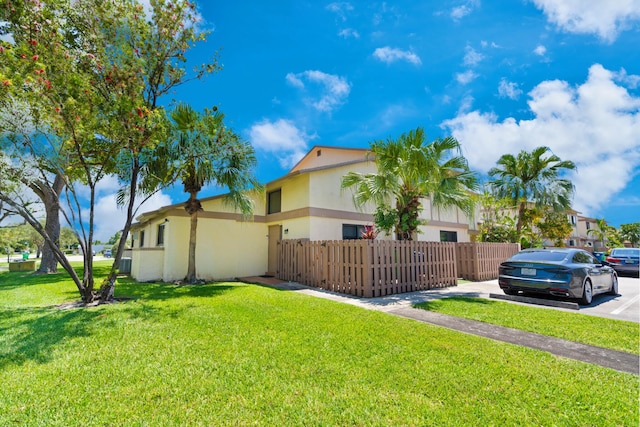 10650 NW 30th Pl Unit 1, Sunrise, FL 33322 - view of property exterior featuring stucco siding