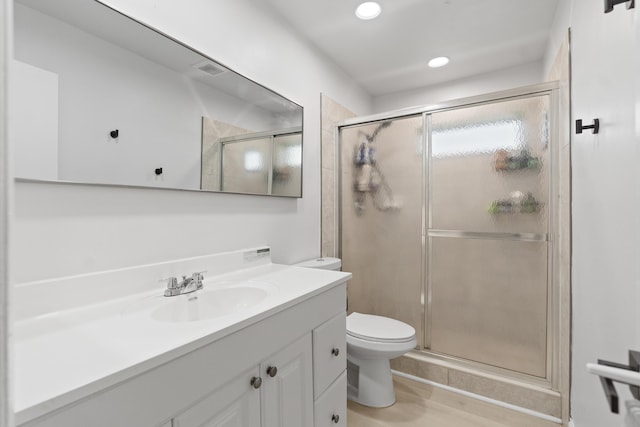 10650 NW 30th Pl Unit 1, Sunrise, FL 33322 - bathroom featuring a stall shower, toilet, vanity, and recessed lighting