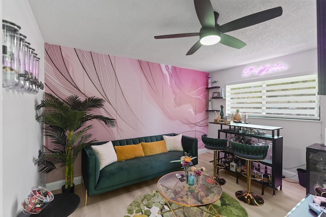 10650 NW 30th Pl Unit 1, Sunrise, FL 33322 - living room with a textured ceiling, a ceiling fan, and wood finished floors