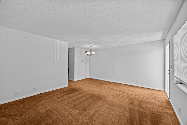 300 NW 30th Ct Unit 202, Pompano Beach, FL 33064 - carpeted empty room with a chandelier, a textured ceiling, and baseboards