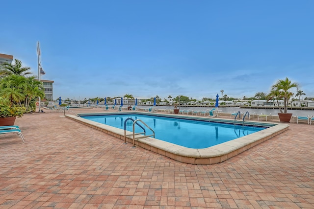 2018 S Federal Hwy Unit 304, Boynton Beach, FL 33435 - community pool with a patio area