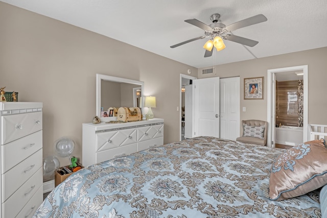 2018 S Federal Hwy Unit 304, Boynton Beach, FL 33435 - bedroom featuring ensuite bathroom, a ceiling fan, and a closet