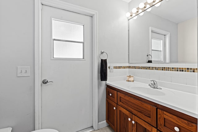 15180 69th Dr N, Palm Beach Gardens, FL 33418 - bathroom featuring vanity and decorative backsplash