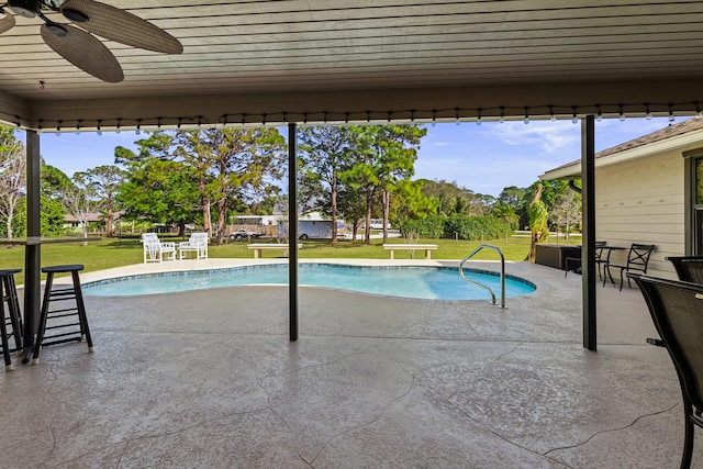 15180 69th Dr N, Palm Beach Gardens, FL 33418 - outdoor pool featuring a patio area, a yard, and ceiling fan