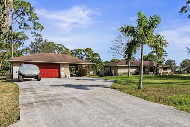 15180 69th Dr N, Palm Beach Gardens, FL 33418 - ranch-style home featuring a front yard, a detached garage, and an outbuilding