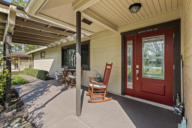 15180 69th Dr N, Palm Beach Gardens, FL 33418 - property entrance featuring covered porch