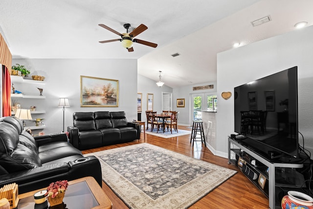 15180 69th Dr N, Palm Beach Gardens, FL 33418 - living area with a ceiling fan, wood finished floors, and lofted ceiling