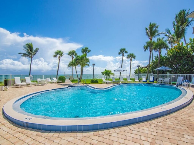 3554 Ocean Dr Unit 202, Vero Beach, FL 32963 - community pool featuring a patio