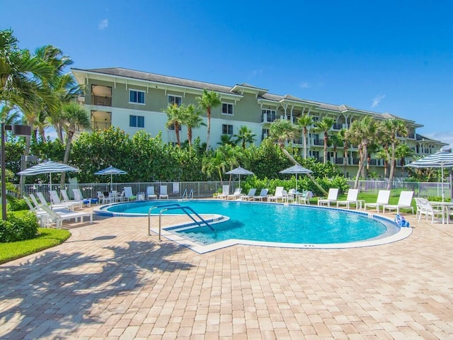 3554 Ocean Dr Unit 202, Vero Beach, FL 32963 - community pool featuring a patio