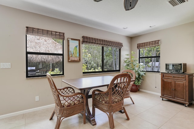 11195 N 159th Ct N, Jupiter, FL 33478 - dining room featuring baseboards, light tile patterned flooring, and recessed lighting