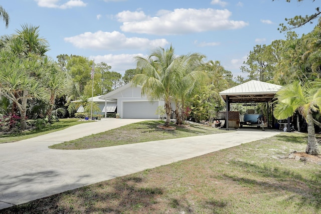 11195 N 159th Ct N, Jupiter, FL 33478 - view of front of property with concrete driveway and a front yard