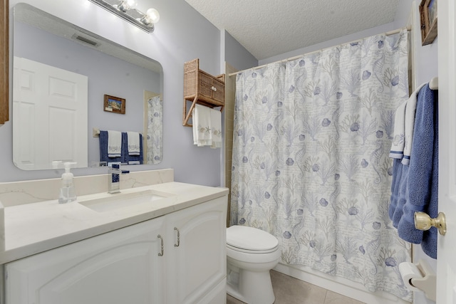 11195 N 159th Ct N, Jupiter, FL 33478 - full bath with tile patterned floors, toilet, vanity, a textured ceiling, and curtained shower
