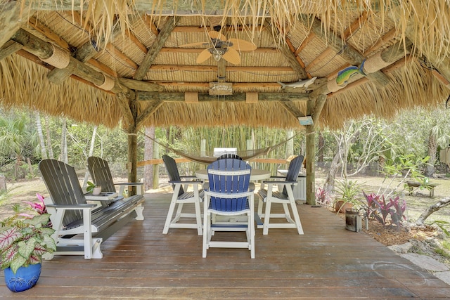 11195 N 159th Ct N, Jupiter, FL 33478 - wooden terrace featuring a gazebo, outdoor dining area, and ceiling fan