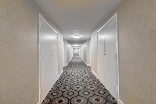 2697 N Ocean Blvd Unit 407-F, Boca Raton, FL 33431 - corridor featuring baseboards