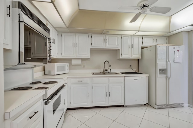 2697 N Ocean Blvd Unit 407-F, Boca Raton, FL 33431 - kitchen with white appliances, a sink, light countertops, and a ceiling fan