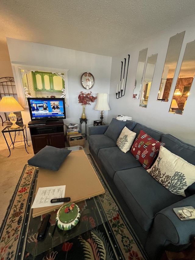 262 Sussex M, West Palm Beach, FL 33417 - living room featuring a textured ceiling