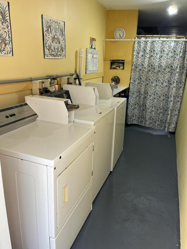 262 Sussex M, West Palm Beach, FL 33417 - shared laundry room featuring independent washer and dryer