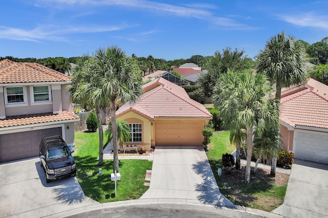 8066 Stirrup Cay Ct, Boynton Beach, FL 33436 - mediterranean / spanish house with driveway, a tiled roof, and stucco siding