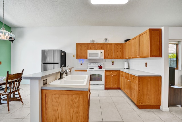 8066 Stirrup Cay Ct, Boynton Beach, FL 33436 - kitchen featuring white appliances, a sink, backsplash, light tile patterned floors, and a textured ceiling