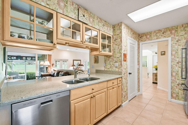 17187 Bay St, Jupiter, FL 33477 - kitchen featuring dishwasher, a sink, wallpapered walls, light brown cabinets, and light tile patterned flooring