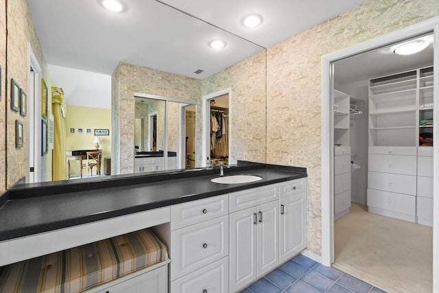 17187 Bay St, Jupiter, FL 33477 - bathroom featuring vanity, a walk in closet, tile patterned flooring, and recessed lighting