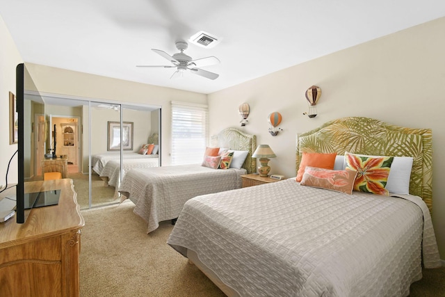 17187 Bay St, Jupiter, FL 33477 - bedroom featuring light carpet, a closet, and ceiling fan