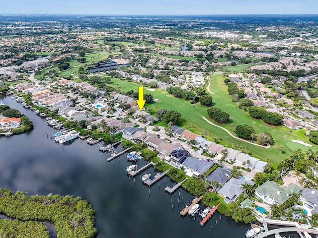 17187 Bay St, Jupiter, FL 33477 - aerial view of property and surrounding area with a nearby body of water, nearby suburban area, and a golf club