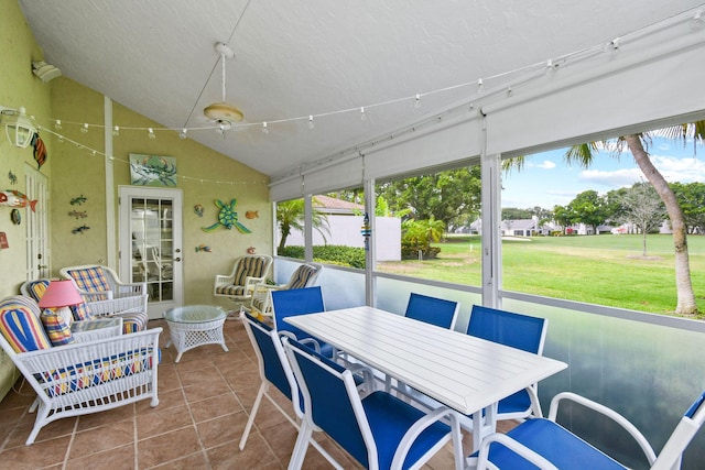 17187 Bay St, Jupiter, FL 33477 - sunroom with lofted ceiling and outdoor dining space
