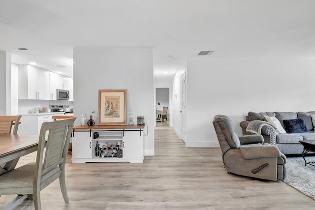 10164 40th Way S Unit 256, Boynton Beach, FL 33436 - living room with light wood-style flooring, baseboards, and recessed lighting