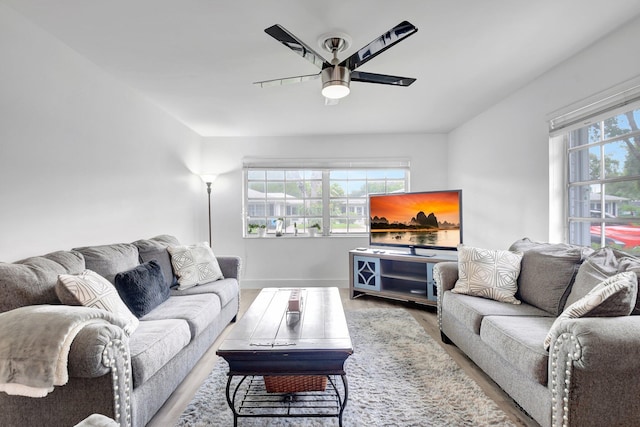 10164 40th Way S Unit 256, Boynton Beach, FL 33436 - living room featuring ceiling fan, wood finished floors, and baseboards