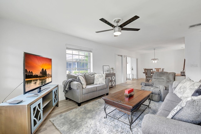10164 40th Way S Unit 256, Boynton Beach, FL 33436 - living area with light wood-type flooring and ceiling fan