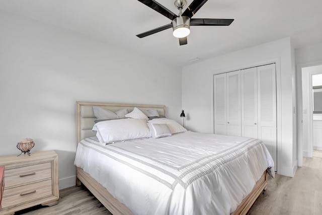 10164 40th Way S Unit 256, Boynton Beach, FL 33436 - bedroom featuring light wood-style flooring, a closet, baseboards, and ceiling fan