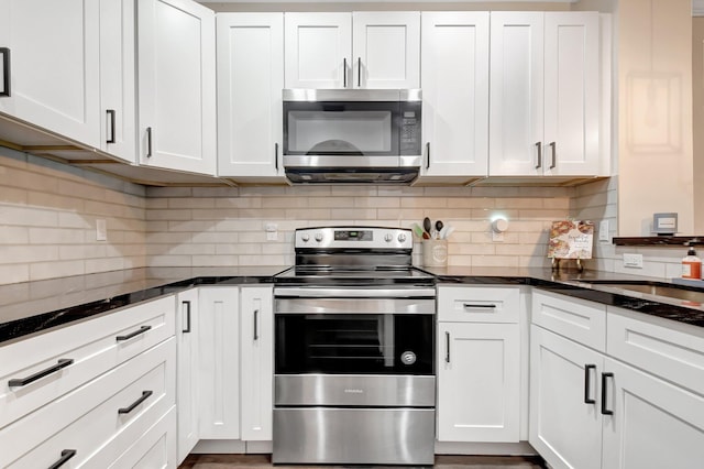 4838 Palmbrooke Cir, West Palm Beach, FL 33417 - kitchen with appliances with stainless steel finishes and white cabinetry