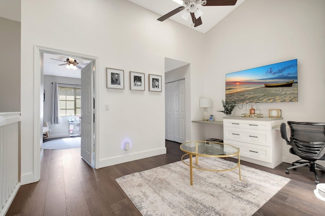 4838 Palmbrooke Cir, West Palm Beach, FL 33417 - office space featuring a ceiling fan, dark wood-style floors, a towering ceiling, and baseboards
