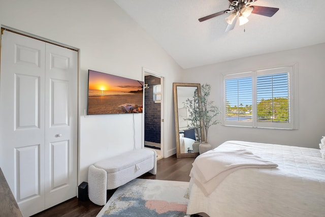 4838 Palmbrooke Cir, West Palm Beach, FL 33417 - bedroom featuring lofted ceiling, dark wood-style floors, a closet, and a ceiling fan