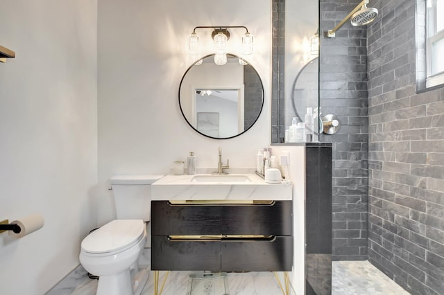 4838 Palmbrooke Cir, West Palm Beach, FL 33417 - full bath with marble look tile flooring, a tile shower, toilet, and vanity