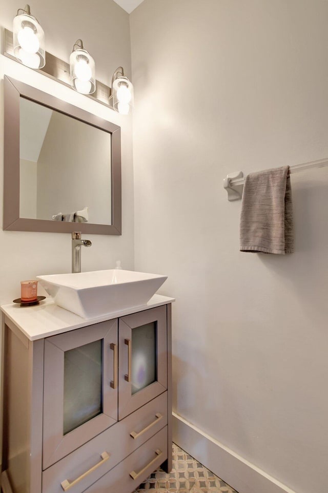 4838 Palmbrooke Cir, West Palm Beach, FL 33417 - bathroom featuring vanity and baseboards