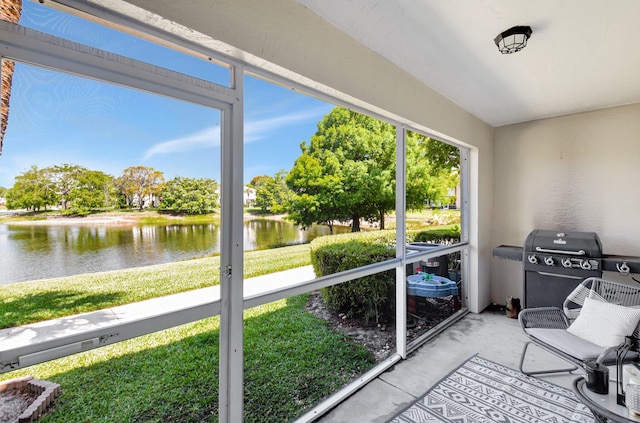 4838 Palmbrooke Cir, West Palm Beach, FL 33417 - sunroom with a water view