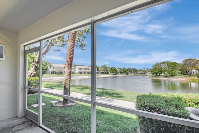 4838 Palmbrooke Cir, West Palm Beach, FL 33417 - unfurnished sunroom featuring a water view and concrete flooring