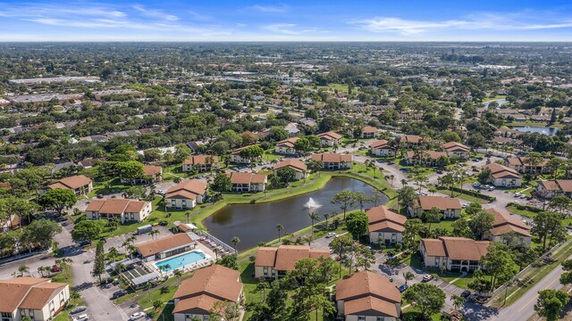 3561 Pine Tree Ct Unit A-2, Greenacres, FL 33463 - aerial overview of property's location featuring a nearby body of water, nearby suburban area, and a pool area