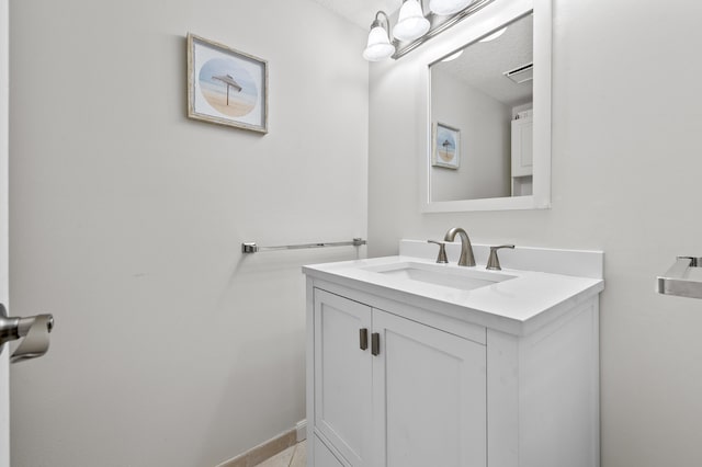 3561 Pine Tree Ct Unit A-2, Greenacres, FL 33463 - bathroom with vanity, baseboards, and a textured ceiling