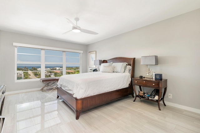 400 Seasage Dr Unit 805, Delray Beach, FL 33483 - bedroom with baseboards and a ceiling fan