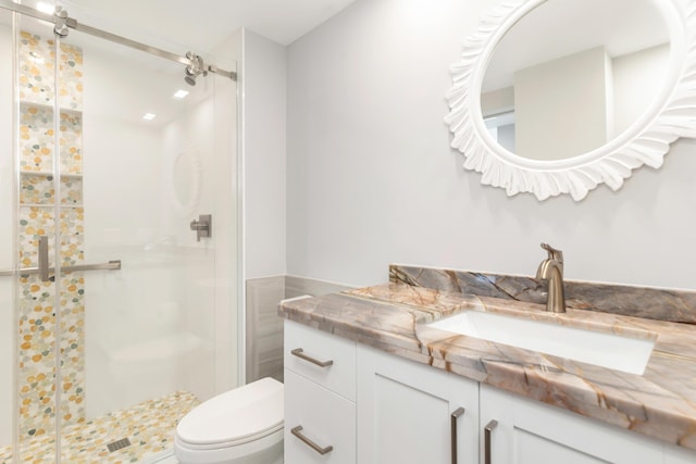 400 Seasage Dr Unit 805, Delray Beach, FL 33483 - bathroom with a stall shower, vanity, and toilet